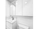 Modern bathroom features a sleek white vanity and mirror cabinet with modern fixtures and stylish tile accents at 407 Sheryl Dr, Deltona, FL 32738