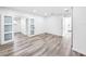 Spacious bedroom featuring white walls and modern paneled doors at 407 Sheryl Dr, Deltona, FL 32738