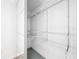 Well-organized walk-in closet with multiple shelves and hanging rods at 407 Sheryl Dr, Deltona, FL 32738