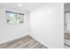 Small bright room with gray tone floors and a window at 407 Sheryl Dr, Deltona, FL 32738