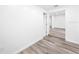 Bright and airy room with gray tone floors and a modern doorway at 407 Sheryl Dr, Deltona, FL 32738
