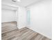View of a bright and clean room with gray tone flooring at 407 Sheryl Dr, Deltona, FL 32738