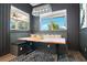 Cozy dining area with custom seating, and a window that has an outdoor view at 4210 Waterfront Pkwy, Orlando, FL 32806