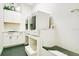 Practical dog wash station featuring a custom tile shower, dog bed, and ample storage at 4210 Waterfront Pkwy, Orlando, FL 32806