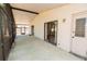 Covered back porch featuring a slider entrance to the house and separate door to the yard at 4336 Cloverleaf Pl, Casselberry, FL 32707