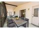 Covered back porch featuring an eating area and lounge area, perfect for relaxing at 4336 Cloverleaf Pl, Casselberry, FL 32707