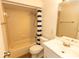 Bathroom featuring a sink and vanity, toilet, and a combined shower and tub at 4336 Cloverleaf Pl, Casselberry, FL 32707