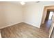 Bright bedroom boasting wood-look floors, neutral paint, and a ceiling fan at 4336 Cloverleaf Pl, Casselberry, FL 32707