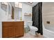 Standard bathroom featuring a shower/tub combo, vanity, and neutral tile at 4918 Gifford Blvd, Orlando, FL 32821