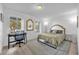 Well-lit bedroom with a large window and a work-from-home setup at 4918 Gifford Blvd, Orlando, FL 32821