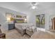 Bright main bedroom with sliding glass door access to the backyard, neutral decor, and a serene atmosphere at 4918 Gifford Blvd, Orlando, FL 32821