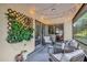 Inviting screened patio with stylish decor, perfect for outdoor entertaining and relaxing at 4918 Gifford Blvd, Orlando, FL 32821
