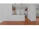 Open floorplan kitchen featuring stainless steel appliances and bar seating area at 5038 Fenwood Ln, Orlando, FL 32814