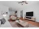 Inviting living area with open floor plan and view of the kitchen and dining room at 5038 Fenwood Ln, Orlando, FL 32814