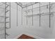 Spacious walk-in closet featuring custom wire shelving at 5038 Fenwood Ln, Orlando, FL 32814