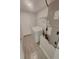 Functional laundry area with a washer, shelving, and exterior access door at 506 Peace Way, Kissimmee, FL 34759