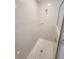 Bright and clean shower stall featuring white tile and a built in soap holder at 506 Peace Way, Kissimmee, FL 34759
