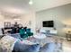 View of modern living room and dining area featuring stylish decor at 507 Ocean Course Ave # 507, Davenport, FL 33896