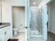 Bright bathroom featuring modern shower and toilet, and vanity with sink at 507 Ocean Course Ave # 507, Davenport, FL 33896
