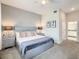 Beautifully designed main bedroom with modern furnishings and ensuite bathroom access at 507 Ocean Course Ave # 507, Davenport, FL 33896