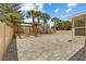Paver patio featuring a custom-built pergola, a swing seat, and meticulously placed palm trees at 528 Seven Oaks Blvd, Winter Springs, FL 32708
