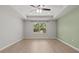Comfortable bedroom with modern ceiling fan, and window with a view at 528 Seven Oaks Blvd, Winter Springs, FL 32708