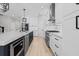 Gourmet kitchen featuring stainless steel appliances, a gas cooktop and a large island at 528 Seven Oaks Blvd, Winter Springs, FL 32708