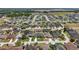 Aerial view showing a community with well-maintained lawns and various home styles at 6758 Hillis Dr, Lakeland, FL 33813