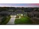 Expansive aerial view showcases the property's manicured lawn and desirable neighborhood at 6758 Hillis Dr, Lakeland, FL 33813
