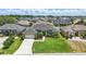 Charming home with verdant lawn and landscaping in a neighborhood with sidewalks at 6758 Hillis Dr, Lakeland, FL 33813