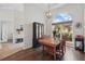 Elegant dining room bathed in natural light from a large window, perfect for entertaining guests at 6758 Hillis Dr, Lakeland, FL 33813