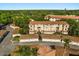 Aerial view of condos, garages, and landscaping in a well-maintained community at 676 Sandy Neck Ln # 102, Altamonte Springs, FL 32714