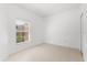 Bright bedroom features a window and tile flooring at 676 Sandy Neck Ln # 102, Altamonte Springs, FL 32714