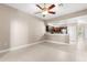 Open-concept dining and living area with view of the breakfast bar at 676 Sandy Neck Ln # 102, Altamonte Springs, FL 32714