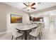 Dining area adjacent to kitchen with marble table and views of breakfast bar at 676 Sandy Neck Ln # 102, Altamonte Springs, FL 32714