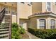 Inviting exterior view of unit 102 with well-manicured landscaping at 676 Sandy Neck Ln # 102, Altamonte Springs, FL 32714