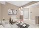 Inviting living room with contemporary furnishings and neutral color palette at 676 Sandy Neck Ln # 102, Altamonte Springs, FL 32714