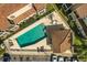Overhead view of community swimming pool featuring lounge seating at 676 Sandy Neck Ln # 102, Altamonte Springs, FL 32714