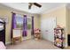 This bedroom provides a bunk bed, closet, and great natural light making the room light and airy at 724 Wildmere Village Cv, Longwood, FL 32750
