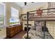 ' bedroom with bunk beds, window, TV, and dresser at 724 Wildmere Village Cv, Longwood, FL 32750
