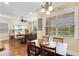 Open-concept living area with comfortable seating, a breakfast nook, and natural light at 724 Wildmere Village Cv, Longwood, FL 32750
