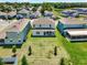 Overhead view showcasing the home's location in a neighborhood with a lush green backyard at 765 Terrapin Dr, Debary, FL 32713