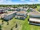 Elevated view showcases a backyard, neighboring homes, and the community layout in a residential neighborhood at 765 Terrapin Dr, Debary, FL 32713