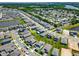Panoramic aerial view of a housing development featuring attractive homes with lush green surroundings at 765 Terrapin Dr, Debary, FL 32713