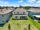 Aerial view of the backyard and neighborhood showcasing the property and surrounding area at 765 Terrapin Dr, Debary, FL 32713