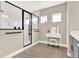 Bright bathroom with a glass-enclosed shower and a vanity table at 765 Terrapin Dr, Debary, FL 32713