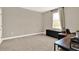 Neutral bedroom with ample natural light, perfect for a home office or guest room at 765 Terrapin Dr, Debary, FL 32713