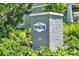 Charming community sign with lush landscaping, creating a welcoming entrance at 765 Terrapin Dr, Debary, FL 32713