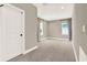 Bright loft space with carpet flooring, recessed lighting, and ample room for furniture at 765 Terrapin Dr, Debary, FL 32713