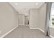 Spacious loft area with plush carpeting and abundant natural light at 765 Terrapin Dr, Debary, FL 32713